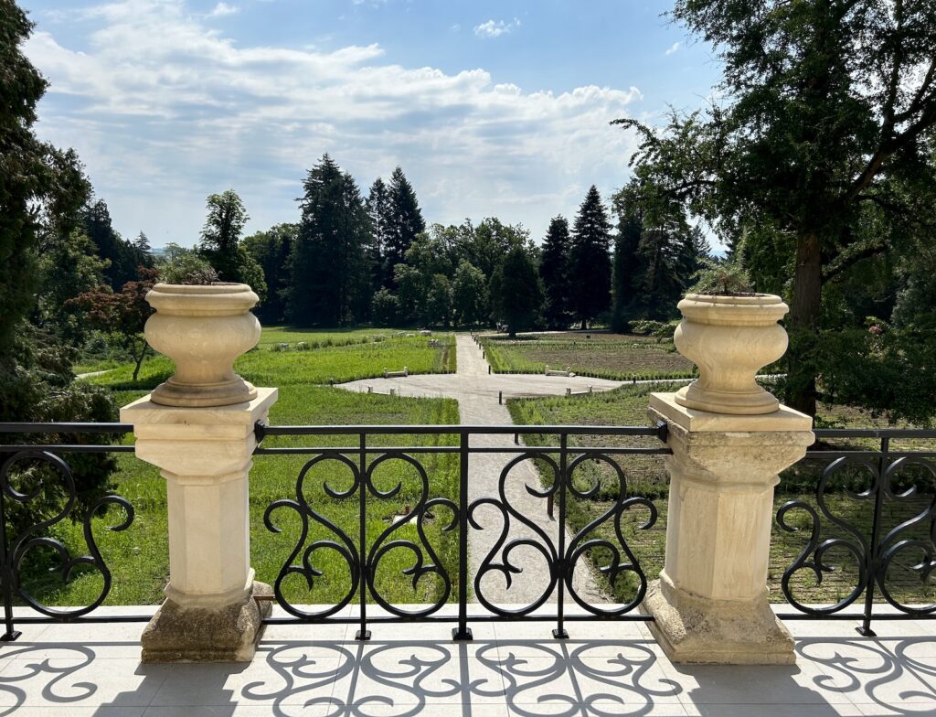 View from the terrace of the castle. Castle terrace overviewing the main arboretum alley below.
