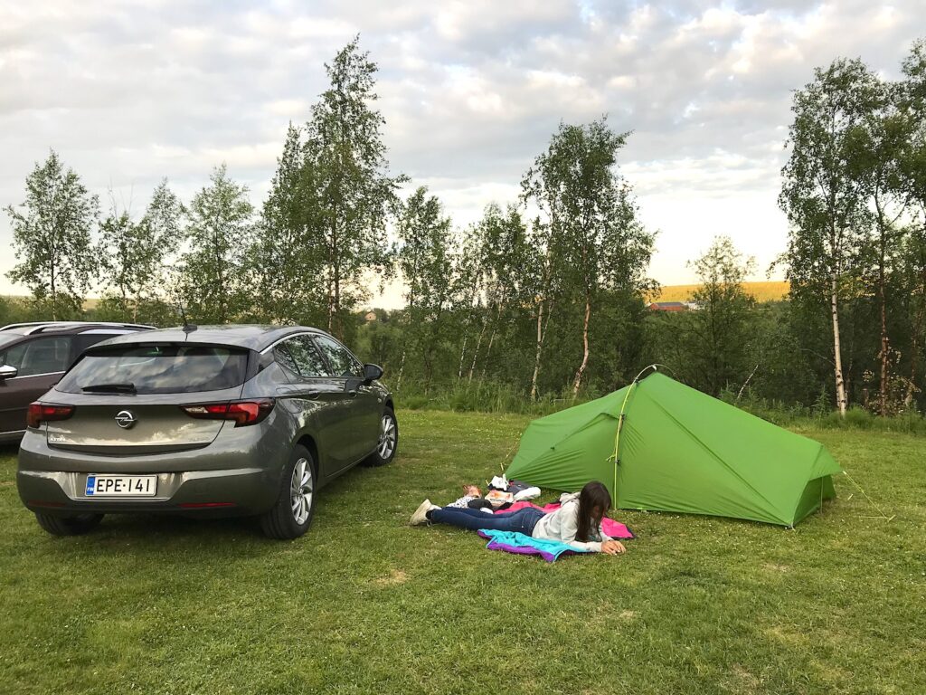 Tent is ready to spend the first night under the midnight sun in Norway.