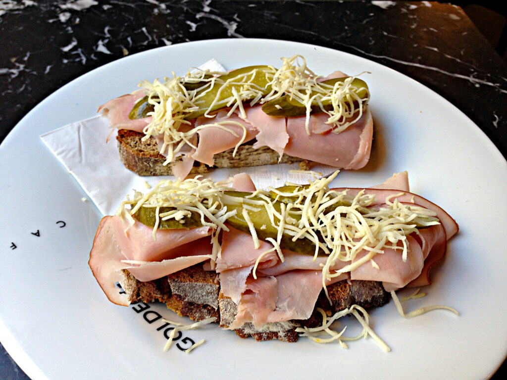 Typical snack at a Vienna coffee house: Sourdough bread with butter, ham, gherkins/pickles and freshly grated horseradish